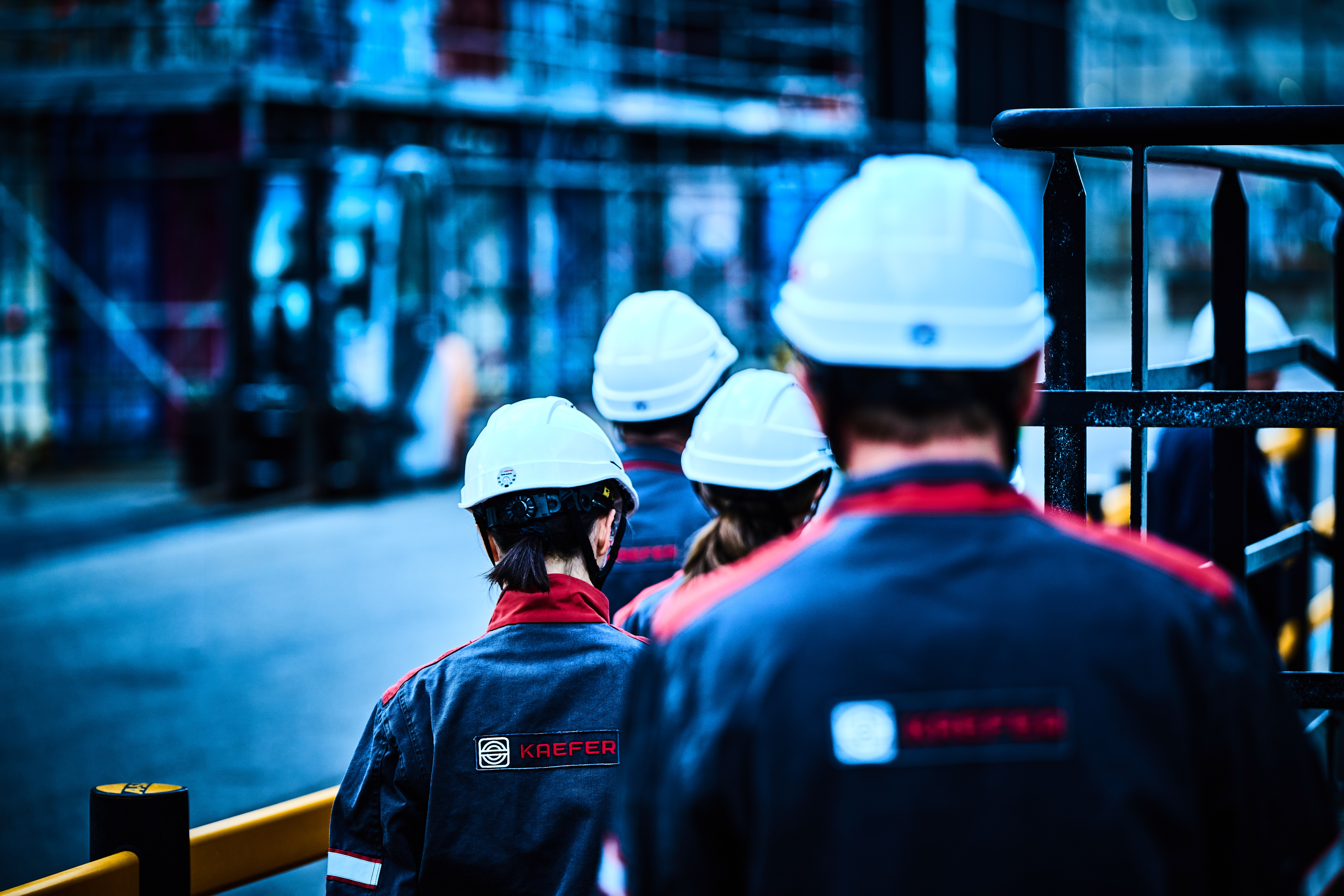 KAEFER employees walking through a project site